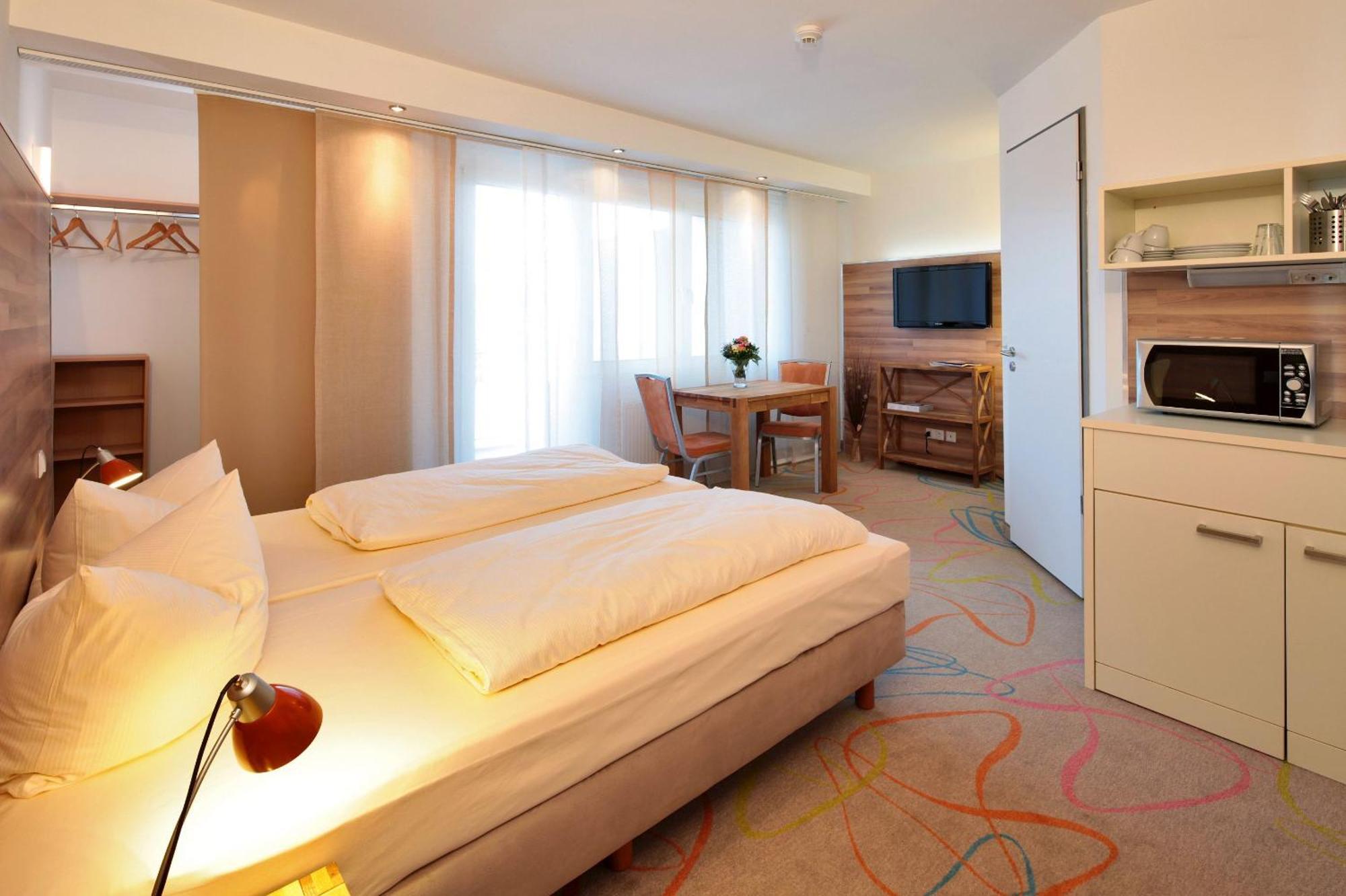 Petul Apart Hotel City Garden Essen Buitenkant foto